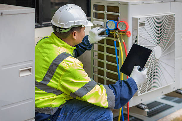 Professional Hvac technician working in Fredericksburg, VA
